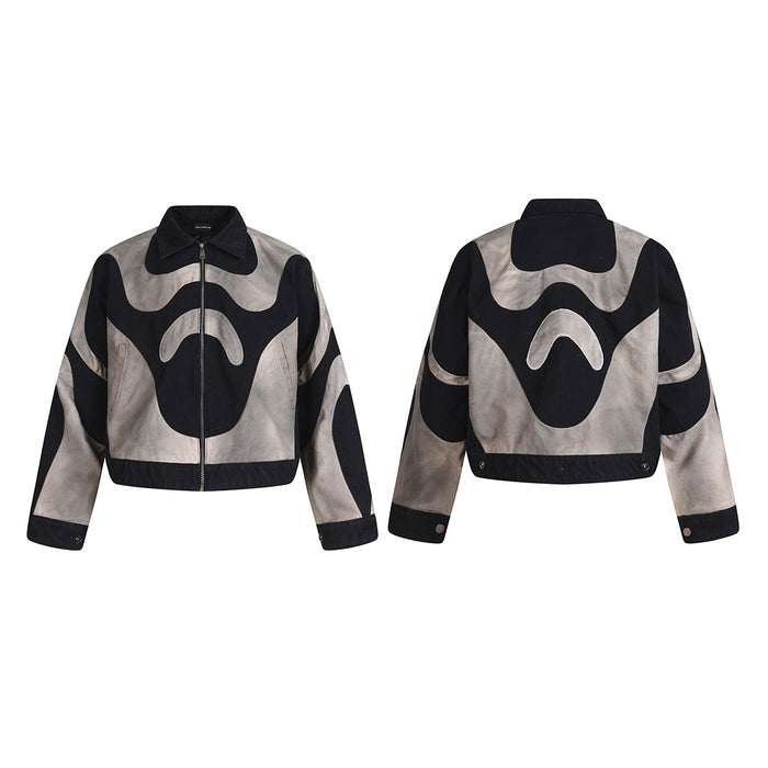 Front and back views of the cropped black and grey abstract patchwork jacket with zip front