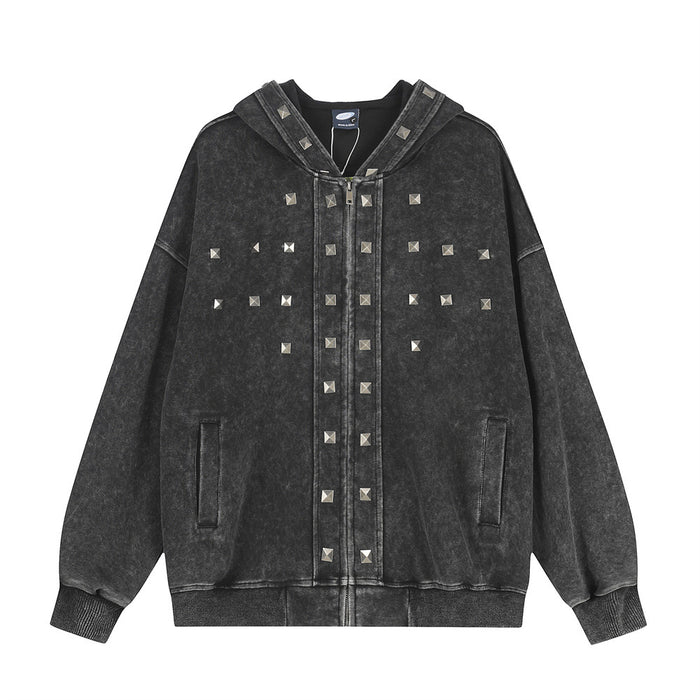 Oversized acid-wash zip-up hoodie in faded charcoal black with silver pyramid studs on chest and hood brim, front and back vi