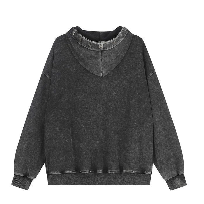 Back view of an acid-washed black hoodie with a plain finish, oversized sleeves, and ribbed hem