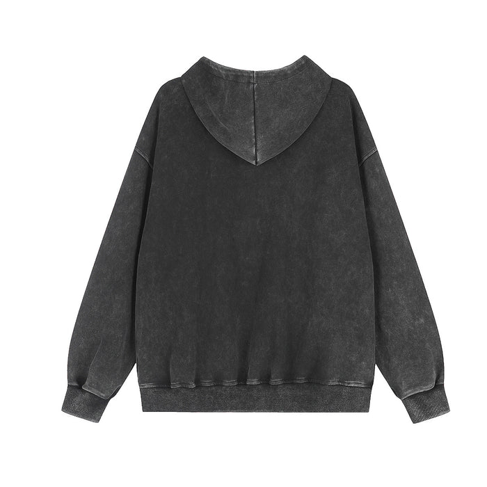 Back view of a dark acid-wash zip-up hoodie showing the plain body, hood, ribbed cuffs, and hem
