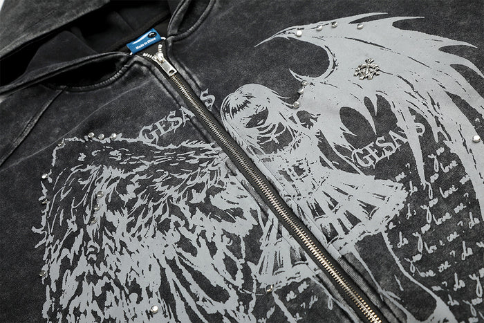 Detailed view of the dark hoodie chest graphic with angel and winged figure artwork, text, and zipper