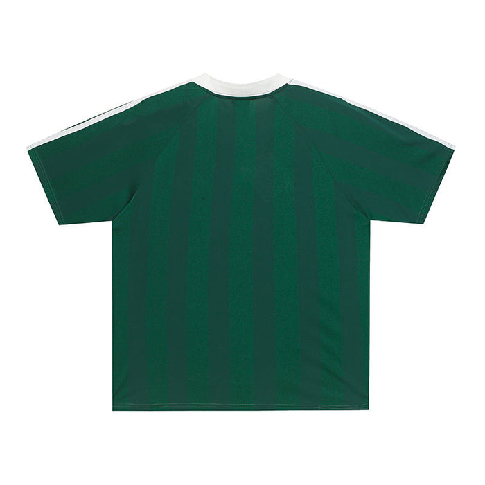 Green performance soccer jersey with white trim, shown from the back in a relaxed streetwear fit
