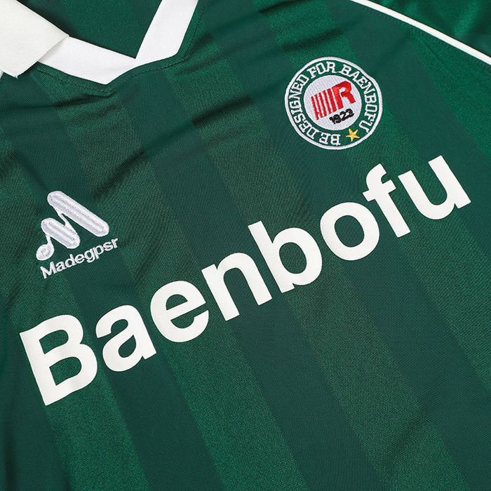 Green Baenbofu performance soccer jersey with white V-neck collar and bold front logo detailing