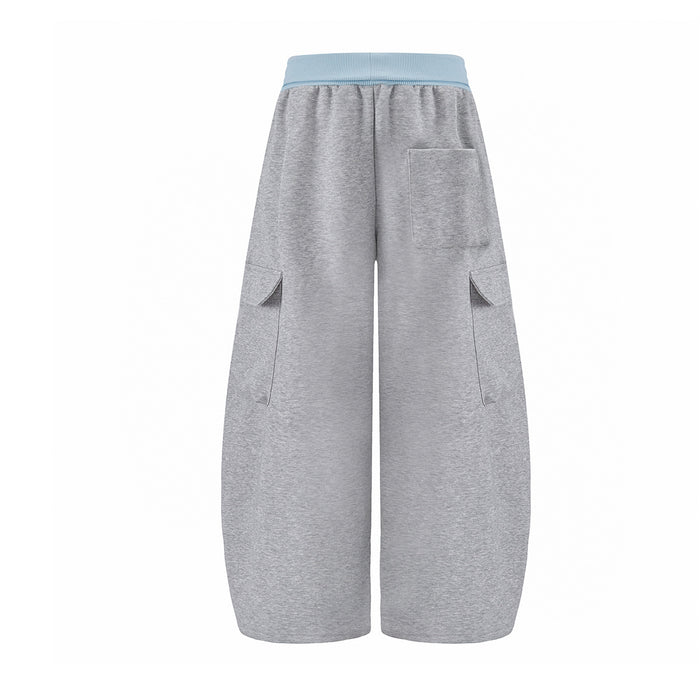 Back view of gray wide-leg cargo sweatpants with a rectangular pocket and side cargo pocket details