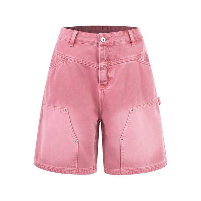Pink carpenter-style denim shorts in a front product view with belt loops, button closure and utility pockets