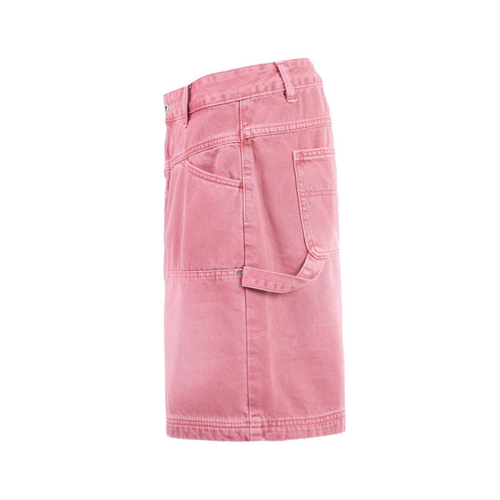Pink denim carpenter shorts shown from the side with a large utility pocket and hanging pocket flap