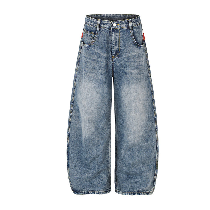 Baggy light wash wide-leg jeans with Union Jack print back waistband, front and back view