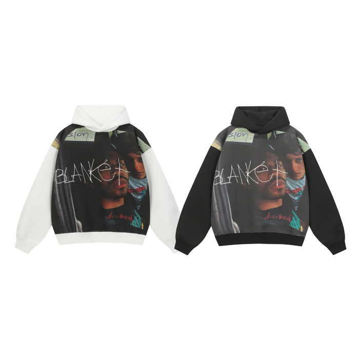 Omirad Graphic Panel Hoodie in white and black colorways showing oversized halftone photo print and contrast sleeves