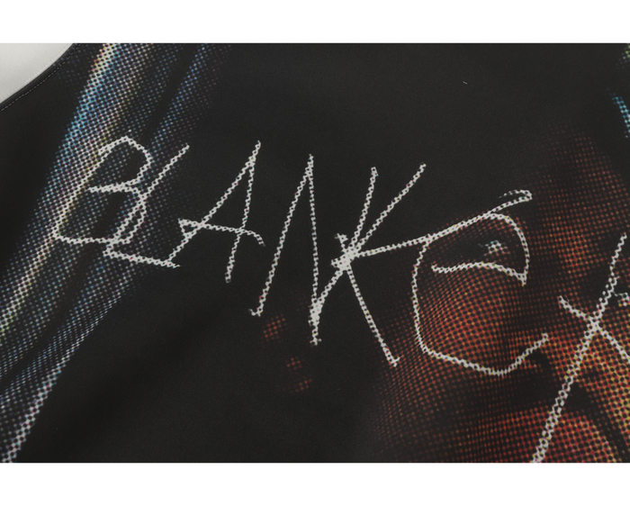 Close-up of the front graphic text reading BLAK on the hoodie print