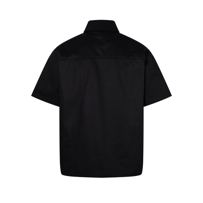 Black short-sleeve button-up shirt with a relaxed streetwear fit and pointed collar, shown from the back on white background