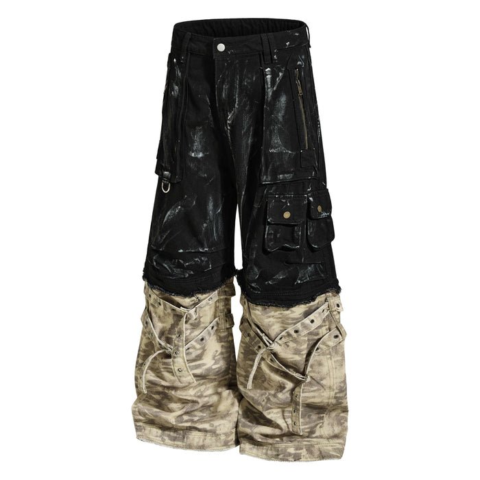 Front view of black washed cargo denim pants with beige camo cuffs and side pockets