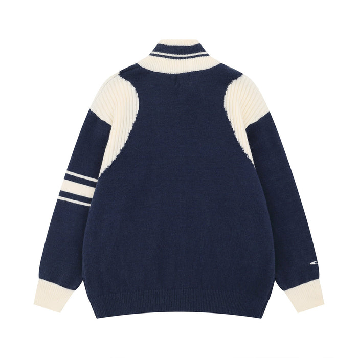 Navy and cream varsity knit zip jacket, back view with striped collar and sleeves