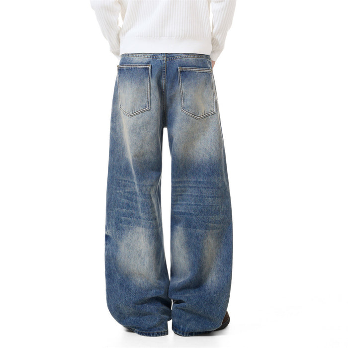 Back view of blue baggy jeans showing two patch pockets and relaxed wide legs