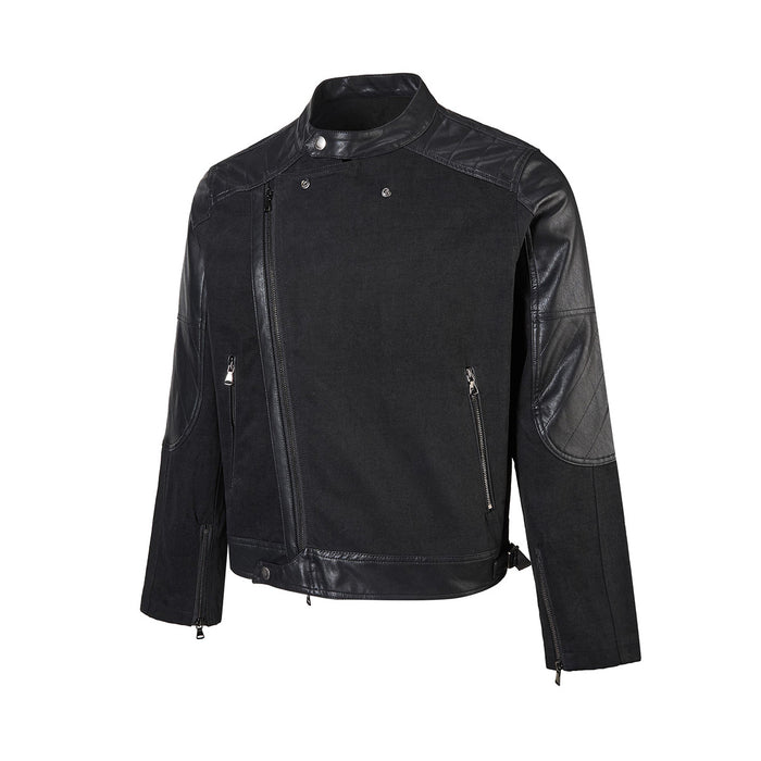Front view of a black boxy moto jacket with denim body, glossy PU leather sleeves and silver zippers