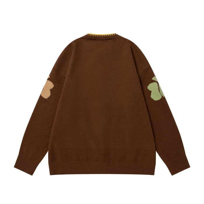Back view of brown knit zip-up cardigan with partial butterfly motifs visible on both sleeves