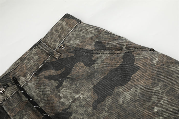 Close-up of the camouflage waistband, belt loop and upper front pocket seam