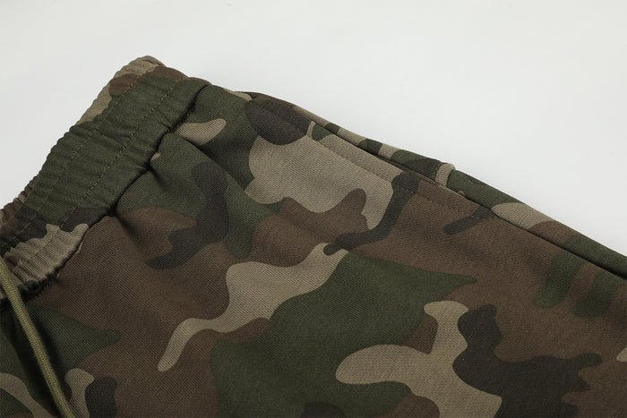 Detailed view of the elastic camouflage waistband and stitched fabric panel