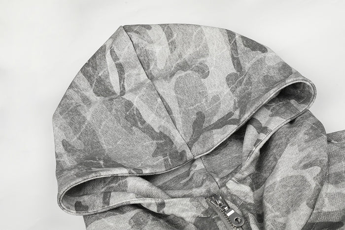 Close-up of the gray camouflage hoodie hood showing its stitched edge and textured fabric