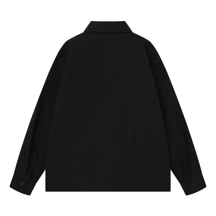 Black long sleeve button-up racing shirt shown from the back with a pointed collar and cuff buttons