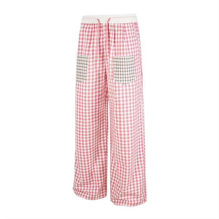Pink gingham wide-leg pants with white waistband and plaid contrast front pockets, angled front view