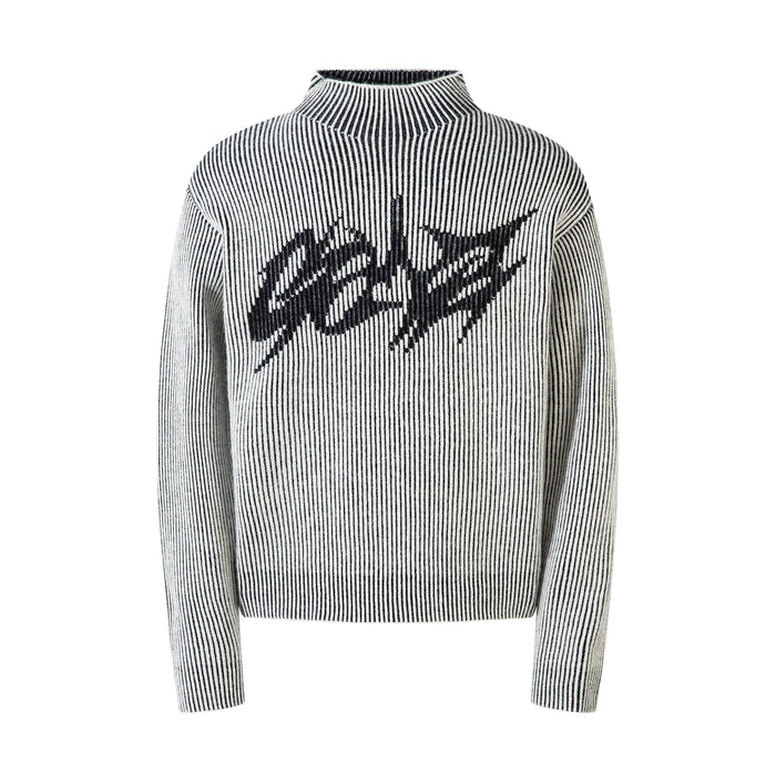 Black and white ribbed knit sweater with bold lightning script graphic on the chest and high mock neck collar