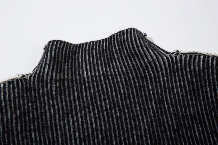 Close-up of black and gray ribbed knit turtleneck collar