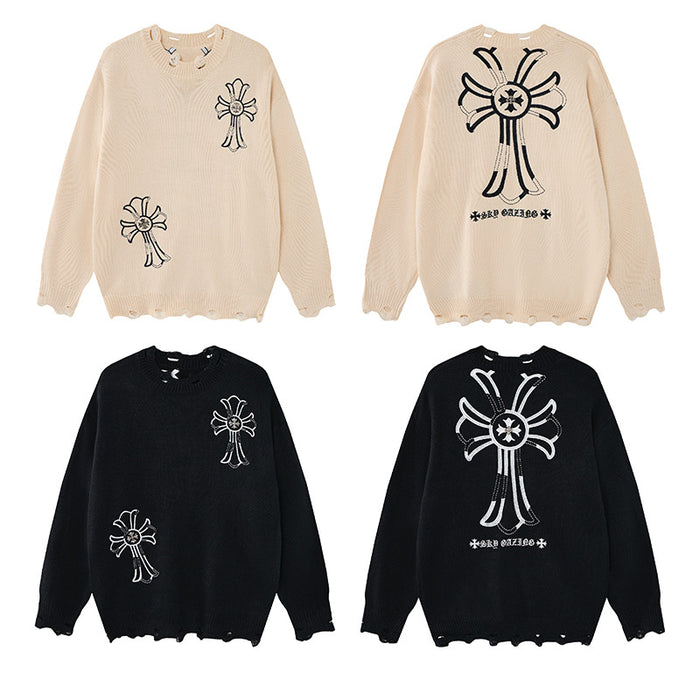 Oversized men's crewneck knit sweater with cross embroidery patches and distressed edges in black and cream colorways