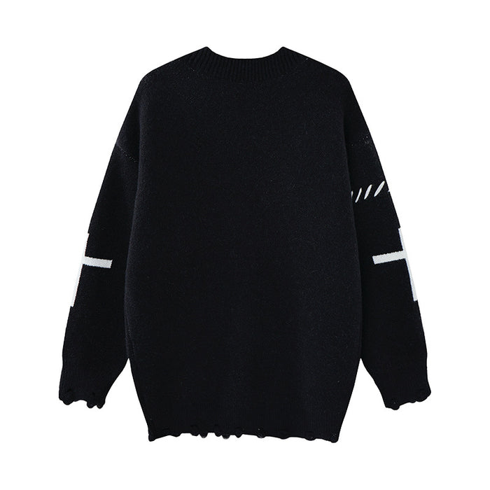 Black knit cardigan shown from the back with plain body, patterned sleeves, ribbed collar, cuffs, and hem