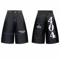 Front and back view of black oversized denim shorts with 404 graphic print and utility patch pockets