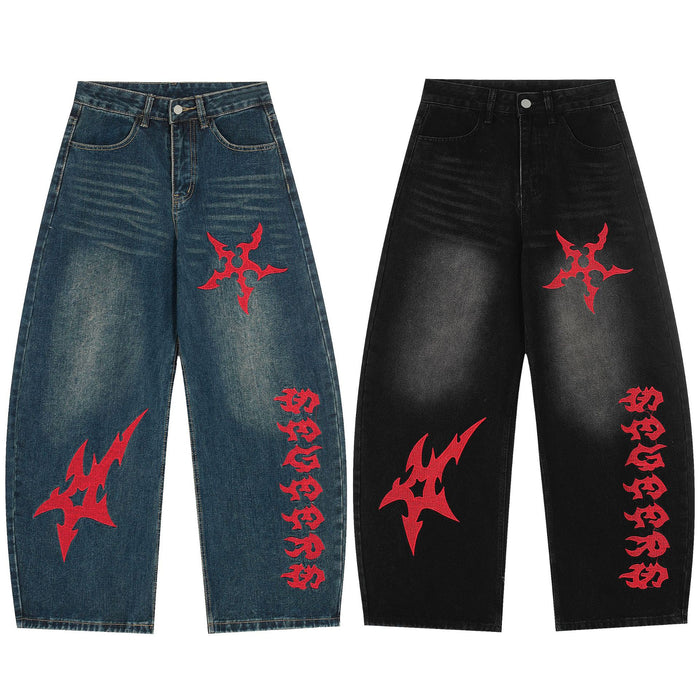 Front views of wide-leg denim jeans in dark blue and black with red Gothic graphics