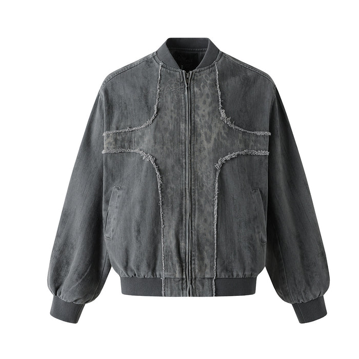 Deconstructed cross-patch washed denim bomber jacket with frayed seams in washed grey, front view