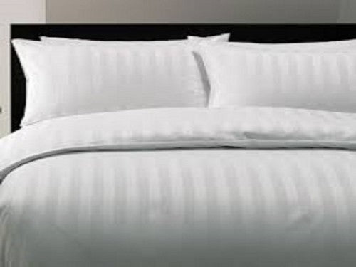 Dolphy Linen 250TC satin stripe white duvet cover on a made hotel bed