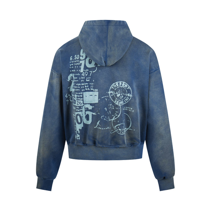 Back view of a washed blue hoodie with oversized distressed typographic and sketch-style graphic