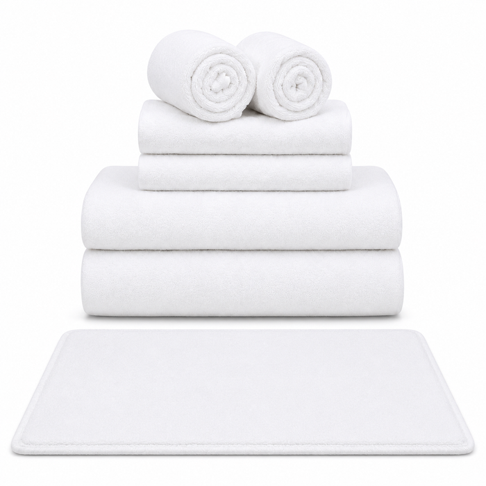 White cotton bath towels stacked
