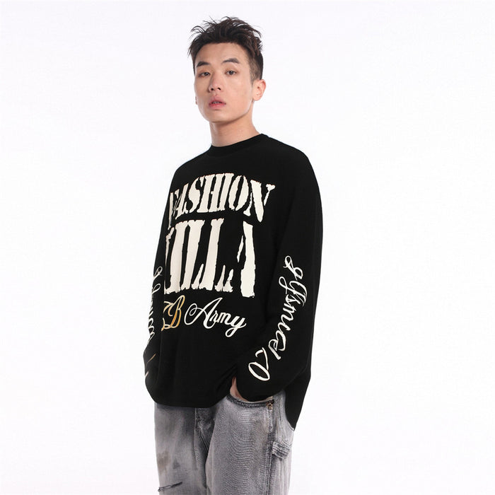 Model wearing the black waffle-knit long sleeve tee with FASHION KILLA front graphic
