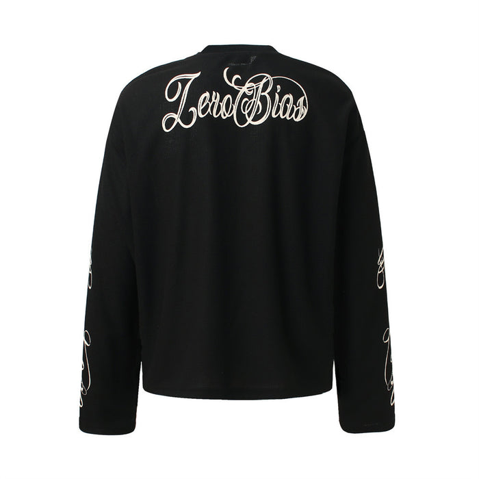Black waffle-knit long sleeve tee displayed from the back with script lettering across the shoulders