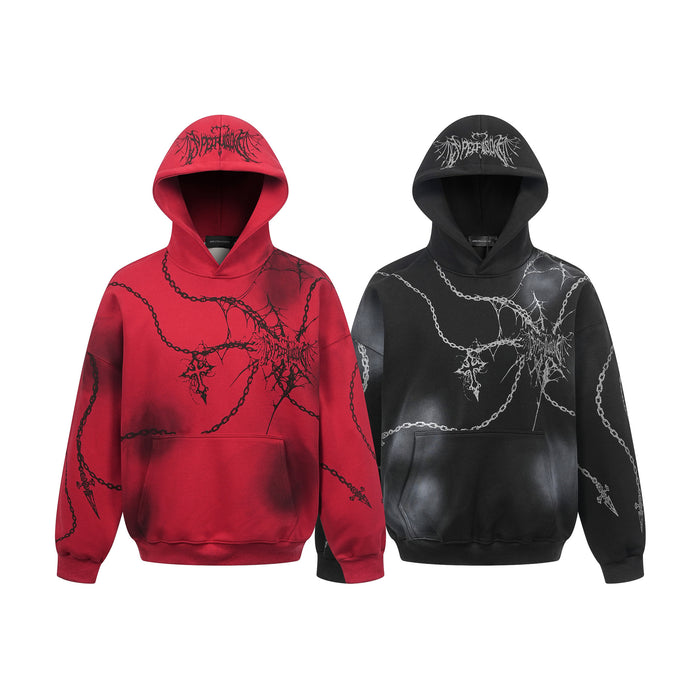 Red and black oversized hoodies with contrasting chain, thorn, and gothic cross graphics shown from the front