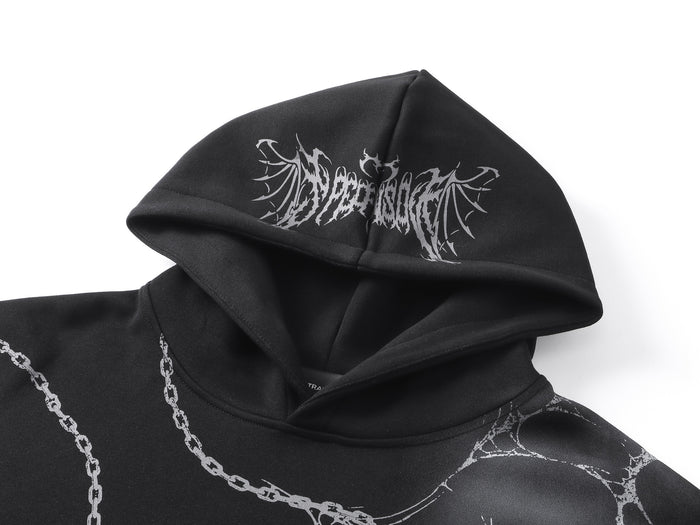Close-up of the black hoodie hood showing a white gothic graphic and chain print across the shoulder