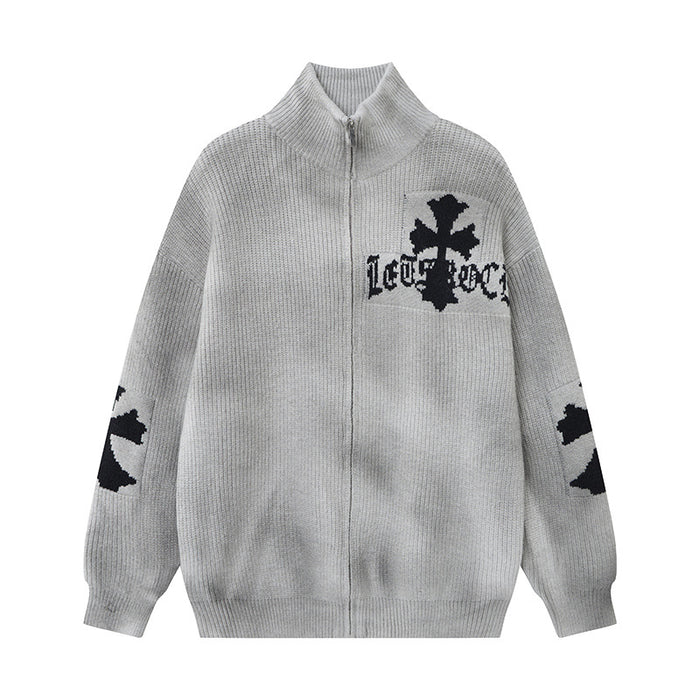 Gray knit zip-up sweater jacket front with raised mock neck, black chest cross graphic, and matching sleeve motifs
