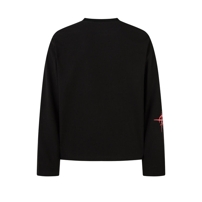 Back view of black long sleeve tee with plain textured knit and no graphic print