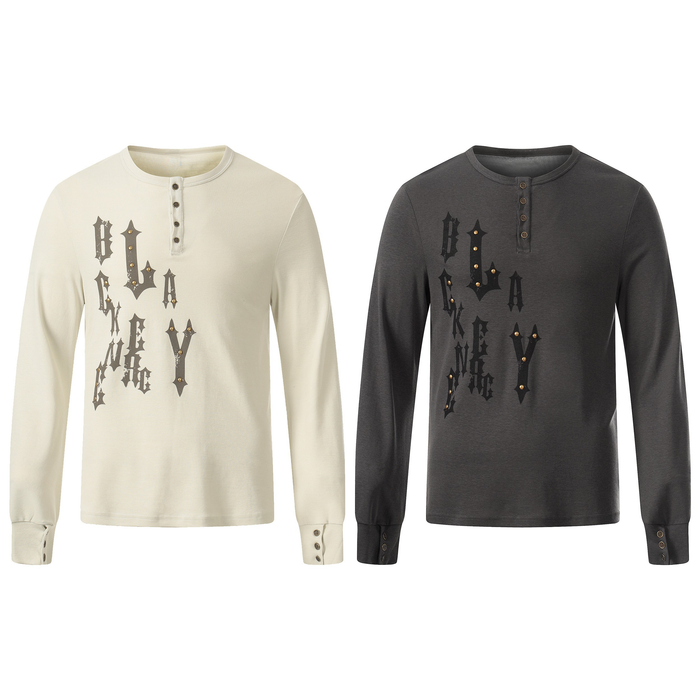 Off-white long sleeve Henley tee with scattered gothic lettering and brass stud accents on a clean white background