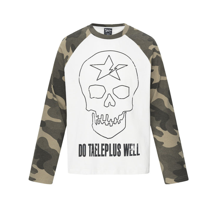 White raglan shirt front with camouflage sleeves, outlined skull graphic, star detail, and slogan