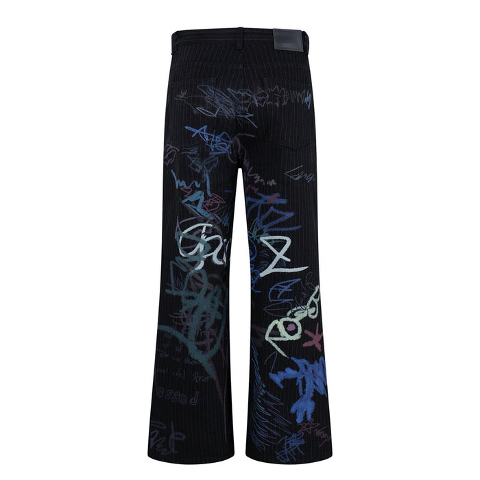 Flat lay back view of black wide-leg jeans with pinstripes and graffiti print