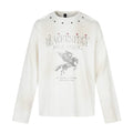 White long-sleeve crew neck shirt with distressed Pegasus graphic, text print, and metal studs around the collar
