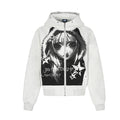 Grey cropped zip-up hoodie with anime character halftone graphic print, star motifs, and metal ring hood detail, front and ba