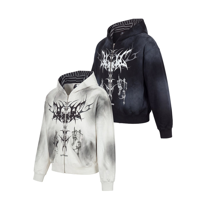 Angled view of white and black zip-up hoodies showing matching gothic front graphics