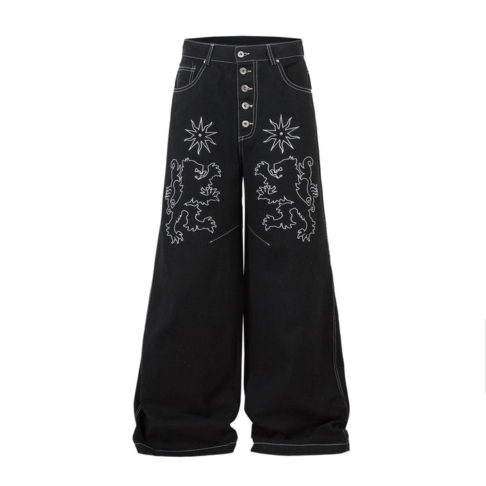Black wide-leg jeans with white lion and star embroidery, front view