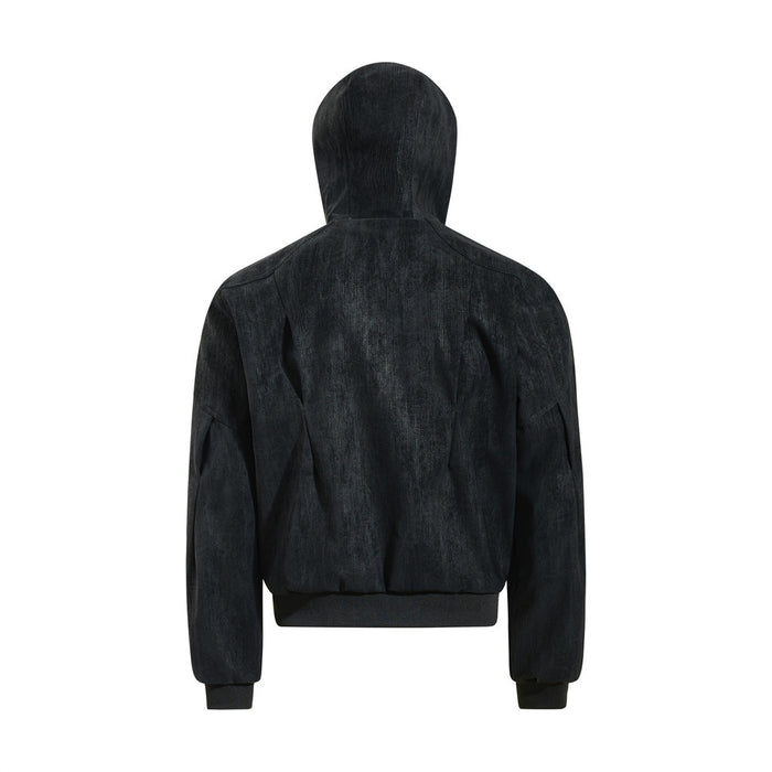 Black hooded bomber jacket shown from the back with a ribbed hem and textured panels