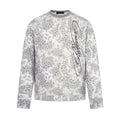 Men's grey snow leopard print long sleeve crew neck tee with vertical script logo graphic on front chest
