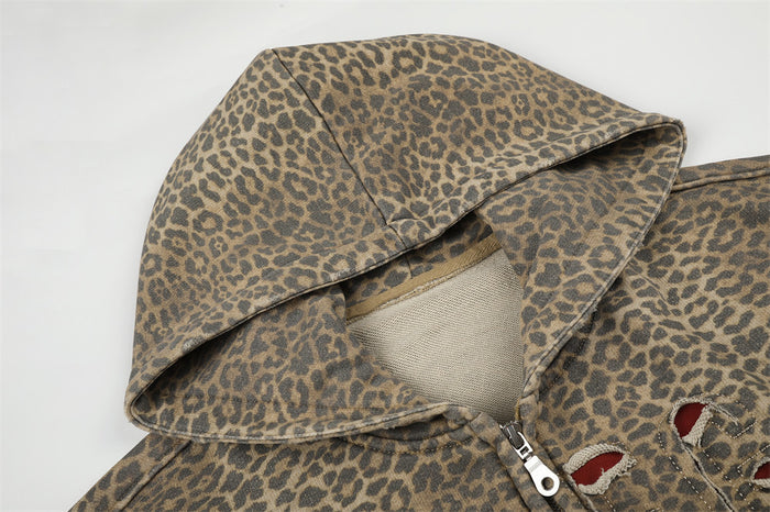 Close-up of leopard print hoodie hood and zipper at the neckline